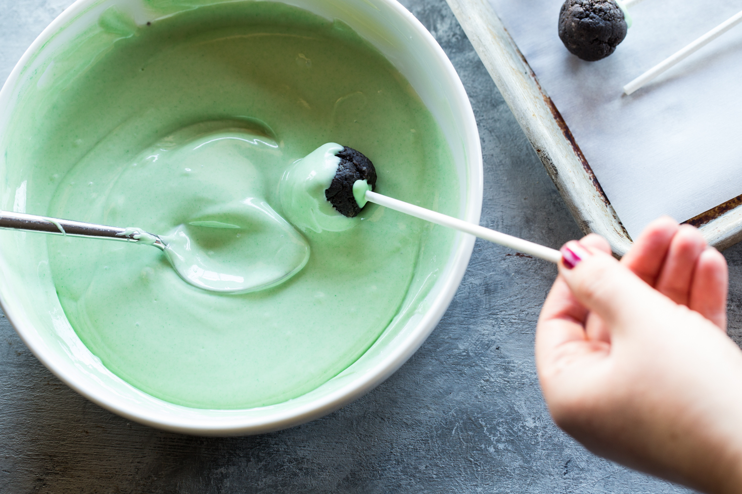 Making these Christmas Tree OREO Cookie Balls is so fun! Get the kids involved and you'll have a great time!