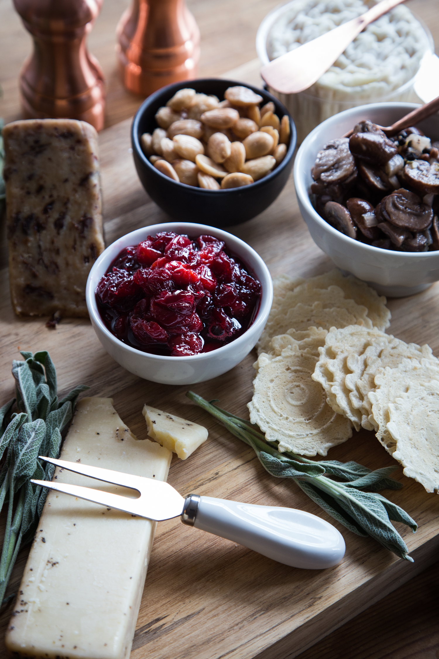 A Holiday Cheese Board with a few extra snacks and a great cocktail is my favorite way to entertain! 