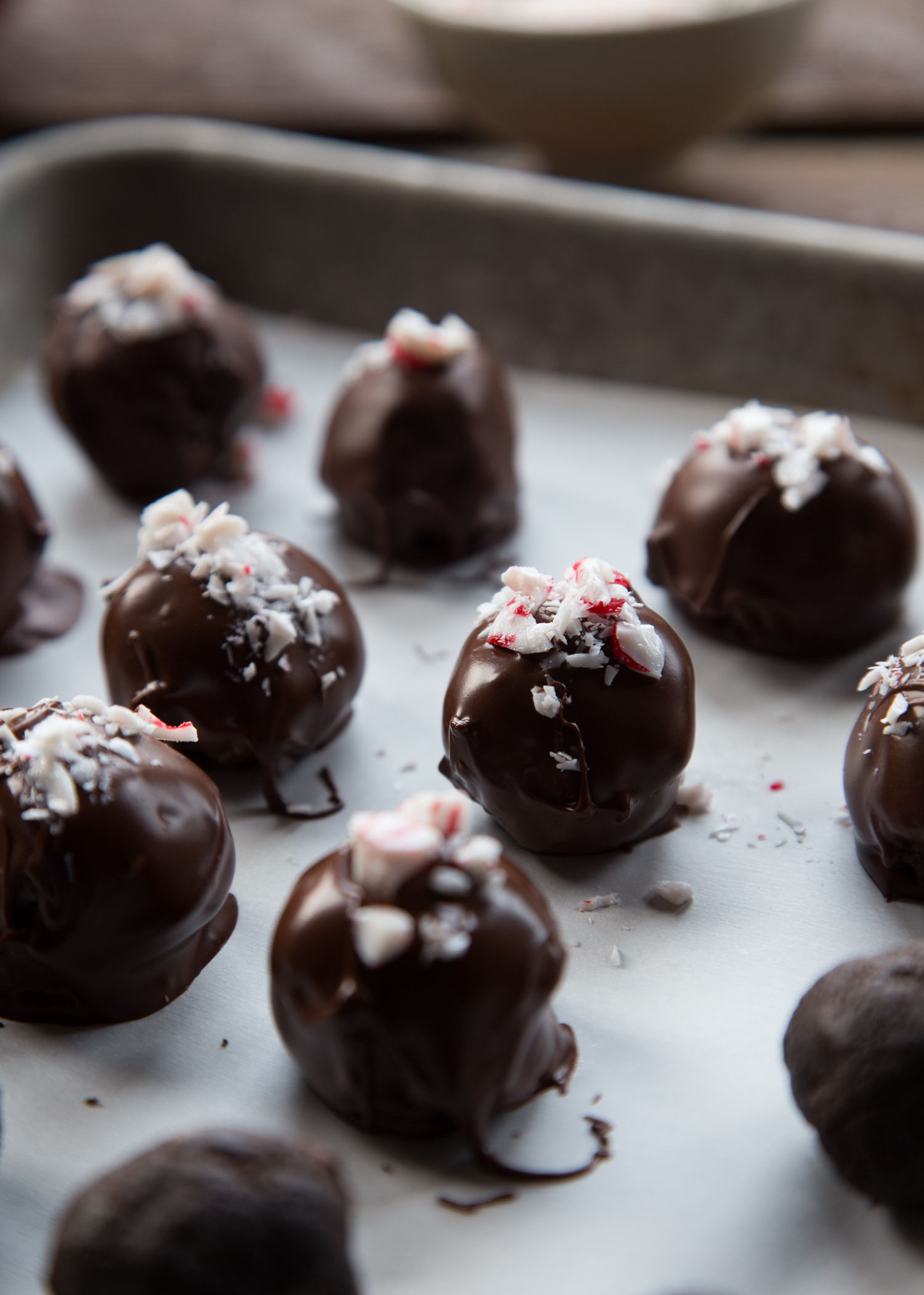 These Peppermint OREO Cookie Balls are dipped in chocolate and sprinkled with crushed Starlight mints. Yum!