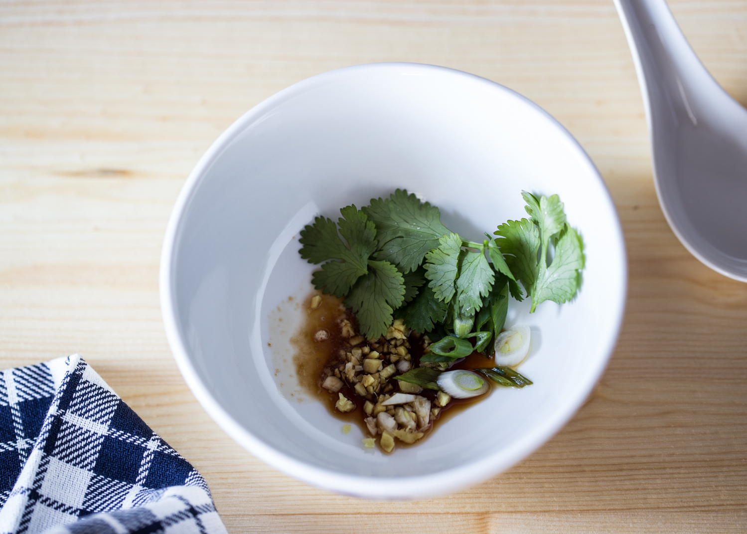 Simple seasonings in a bowl ready to build the homemade wonton soup