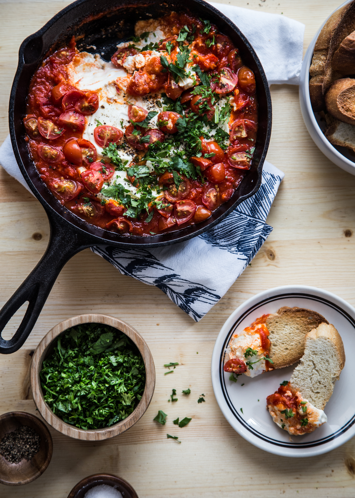 Baked Goat Cheese with Harissa, tomatoes and herbs