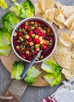 Montmorency Cherry Pineapple Salsa served with corn chips and lettuce cups for a great backyard bbq snack!