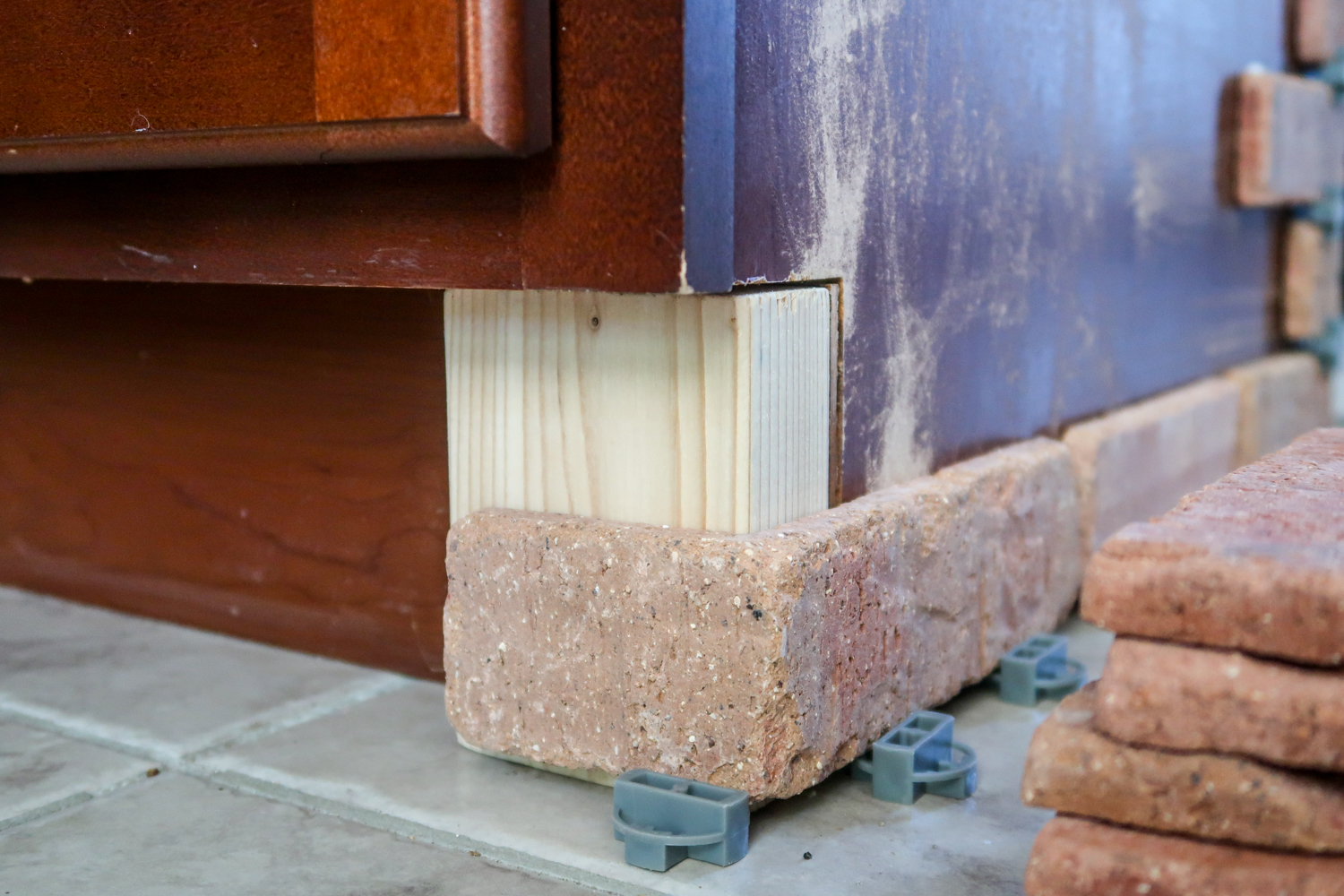 detail of bottom of brick kitchen island