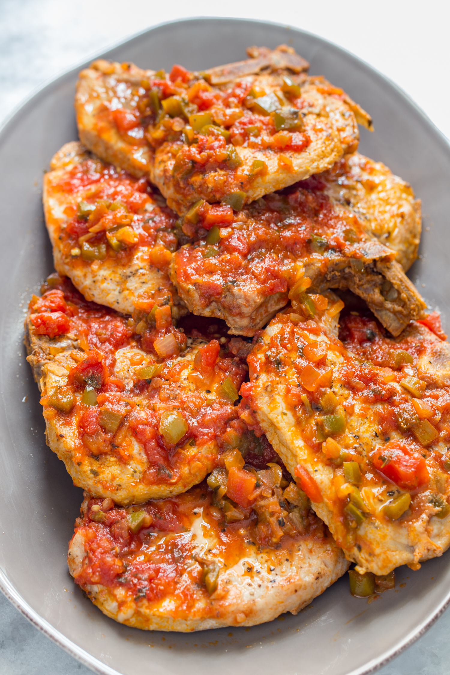 platter of pork chops with salsa