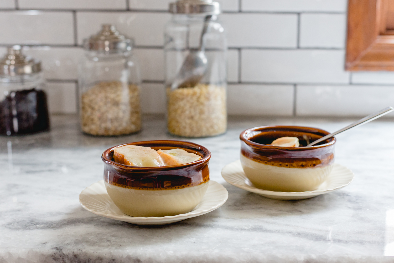 two bowls of soup on counter