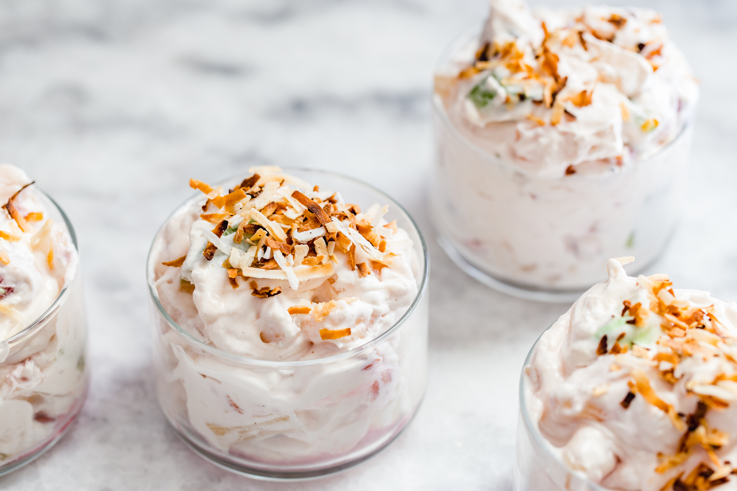 cups of marshmallow salad and coconut