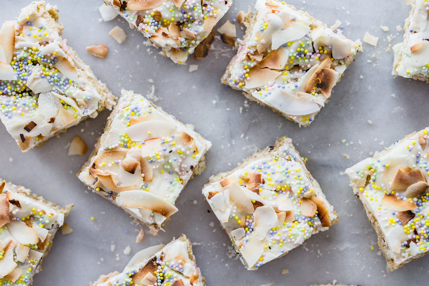 coconut marshmallow treats on marble counter