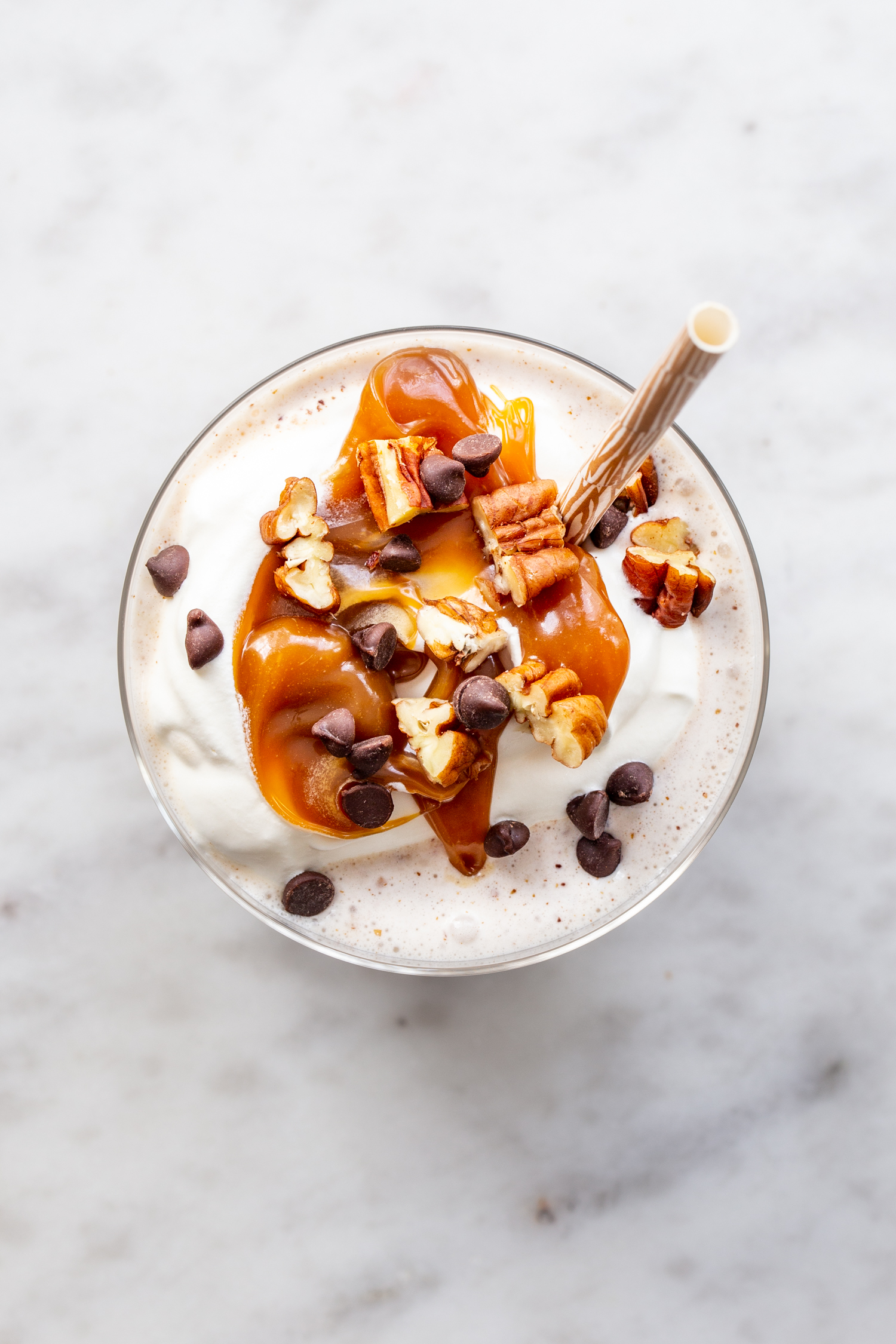 milkshake with caramel, pecans, and chocolate